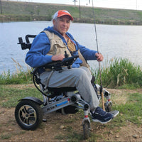 Senior navigating home in a compact power wheelchair