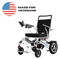 All terrain electric wheelchair with rugged tires for outdoor use