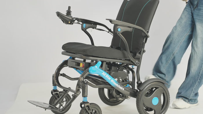 Carbon Atlas carbon fiber electric wheelchair: folding, joystick, LED headlight, flip-up armrest and driving